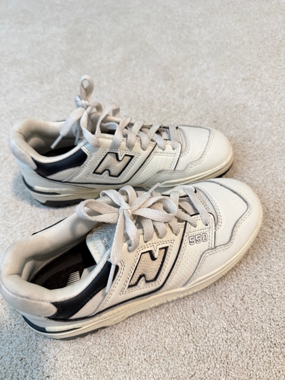 New Balance  550 Sneakers in White and Black Trim